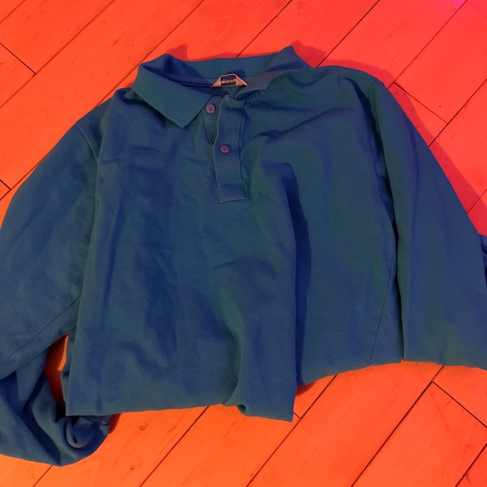 Beautiful blue colored polo long sleeved barely worn